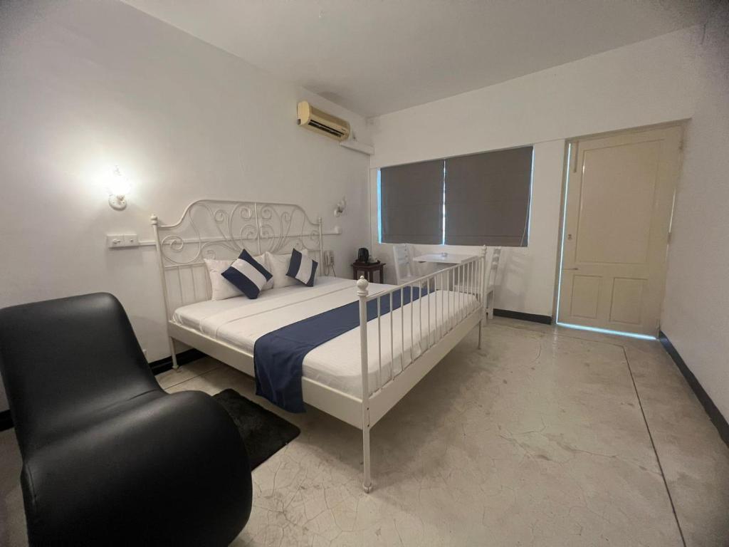 Postel nebo postele na pokoji v ubytování Beverly Villa