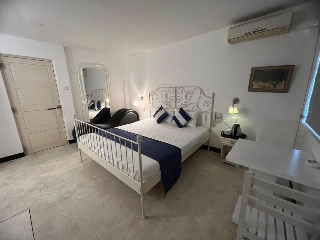 Postel nebo postele na pokoji v ubytování Beverly Villa