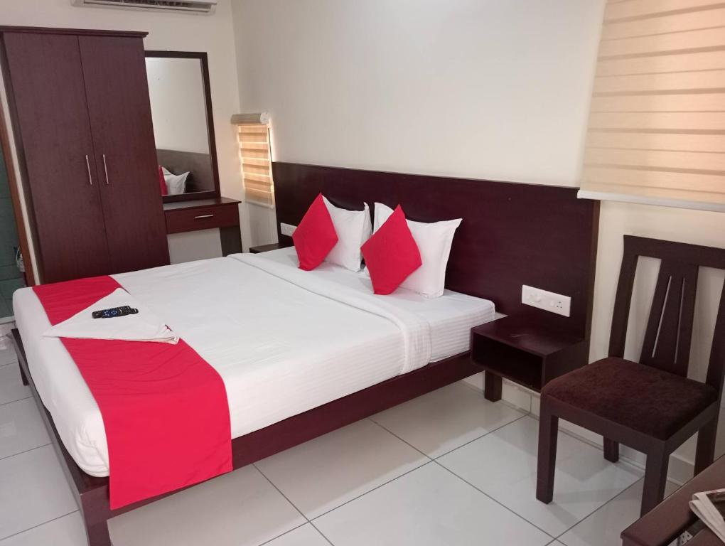 Postel nebo postele na pokoji v ubytování Grace Tourist Home