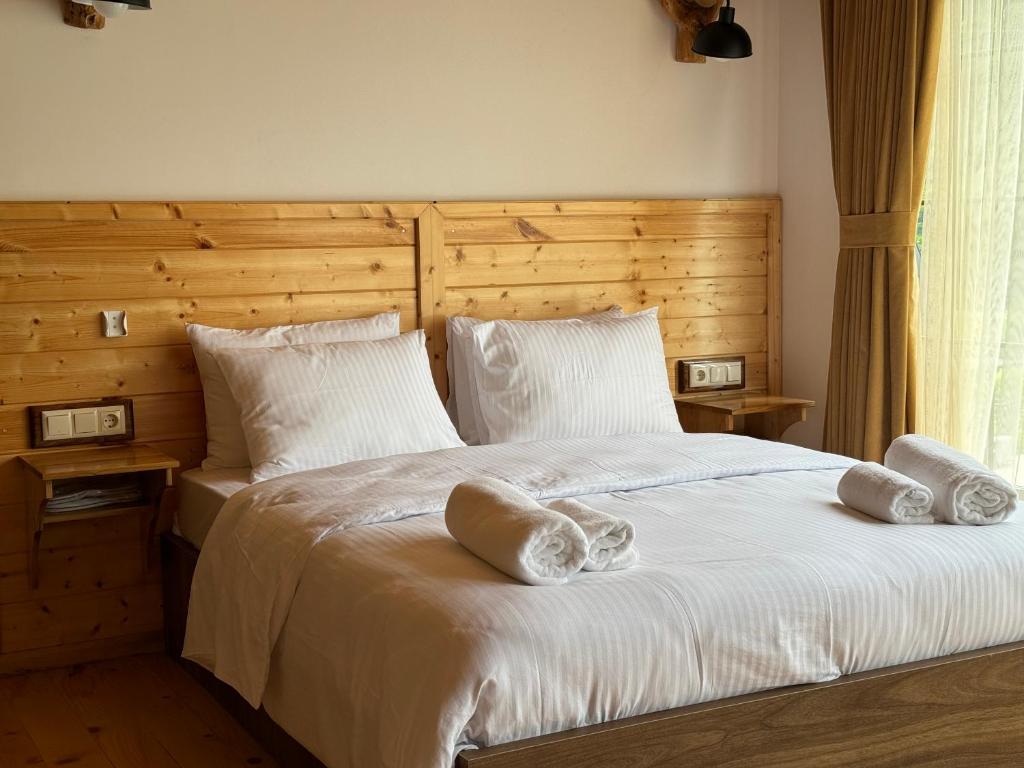 Postel nebo postele na pokoji v ubytování Machakhela Inn - Resort and Winery