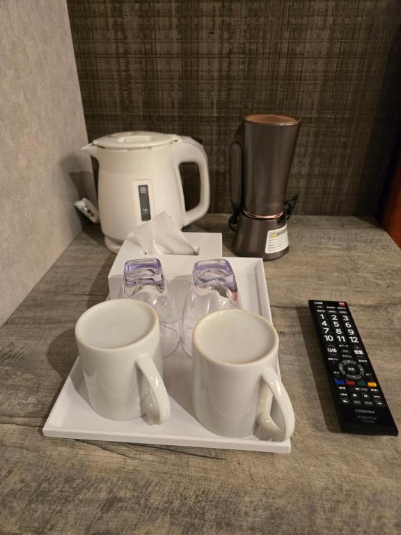 Příslušenství pro přípravu čaje a kávy v ubytování Hotel Japanesque Kyoto Station ZEQUU ANNEX