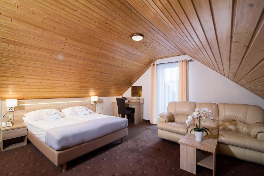 Posteľ alebo postele v izbe v ubytovaní Hotel SPA Activia