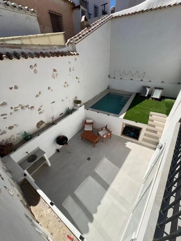 an aerial view of a house with a swimming pool at Casa Azul in Vélez Blanco
