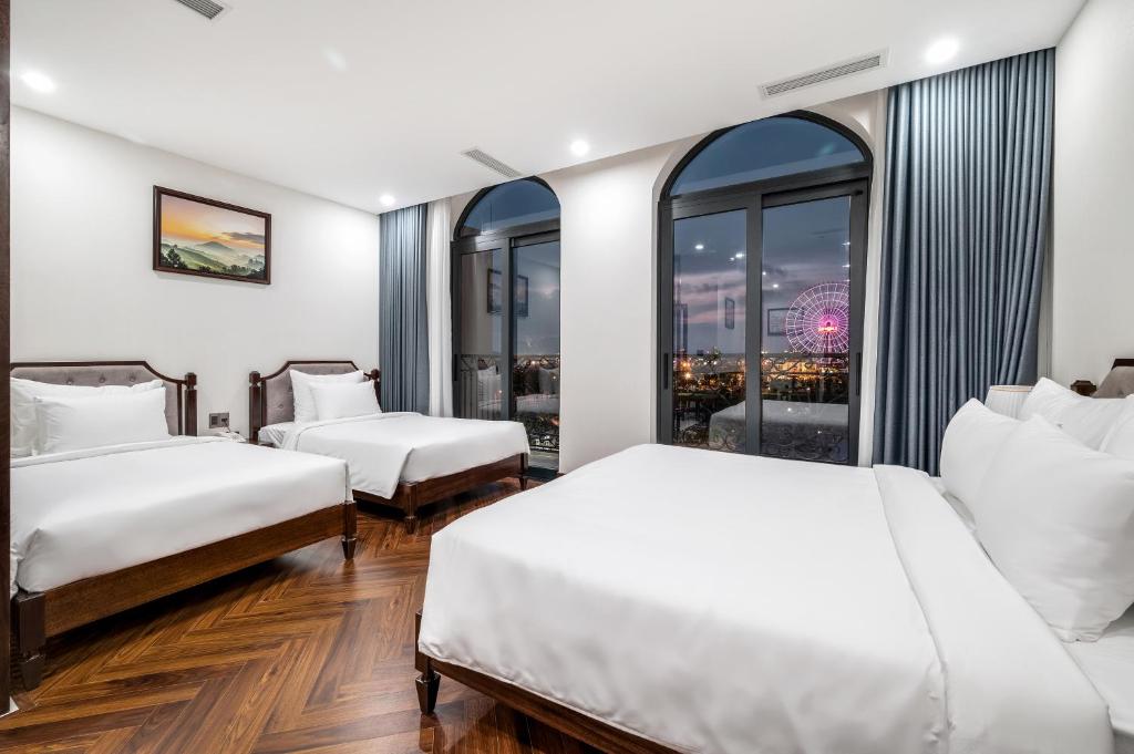 Postel nebo postele na pokoji v ubytování Florence Hotel