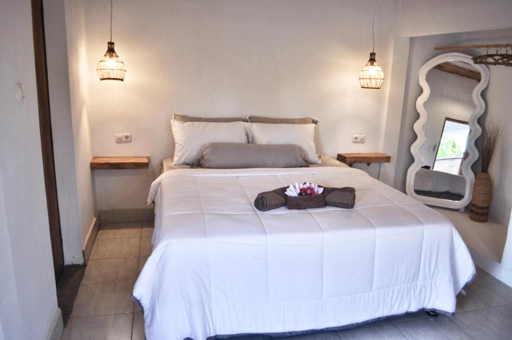 Postel nebo postele na pokoji v ubytování Ripbowl Guest House