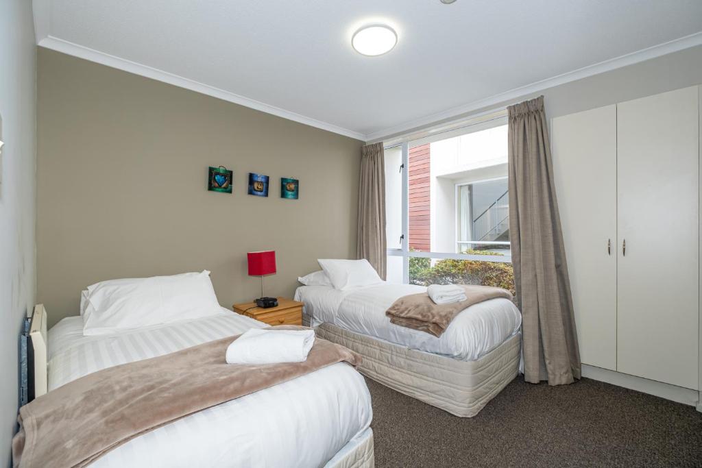 Postel nebo postele na pokoji v ubytování Methven Nest 2-bed Apartment