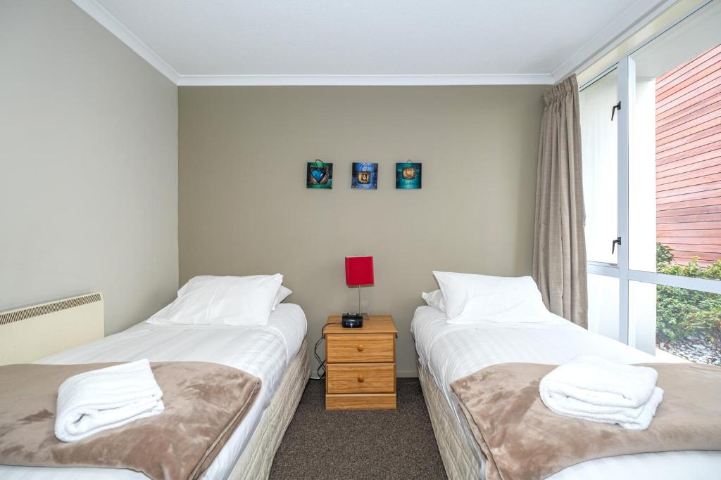 Postel nebo postele na pokoji v ubytování Methven Nest 2-bed Apartment