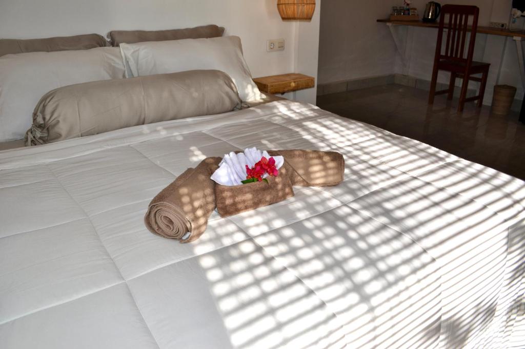 Postel nebo postele na pokoji v ubytování Ripbowl Guest House