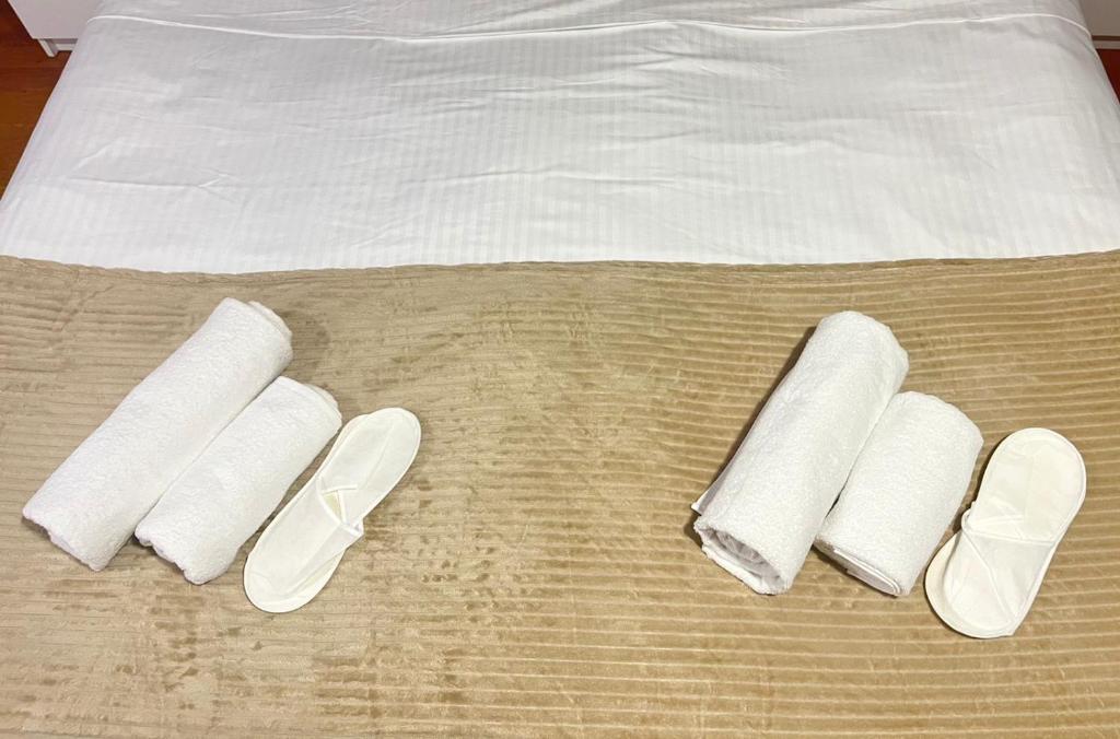 Postel nebo postele na pokoji v ubytování Hotel Doko