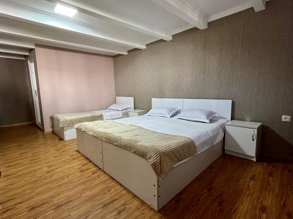 Postel nebo postele na pokoji v ubytování Hotel Doko