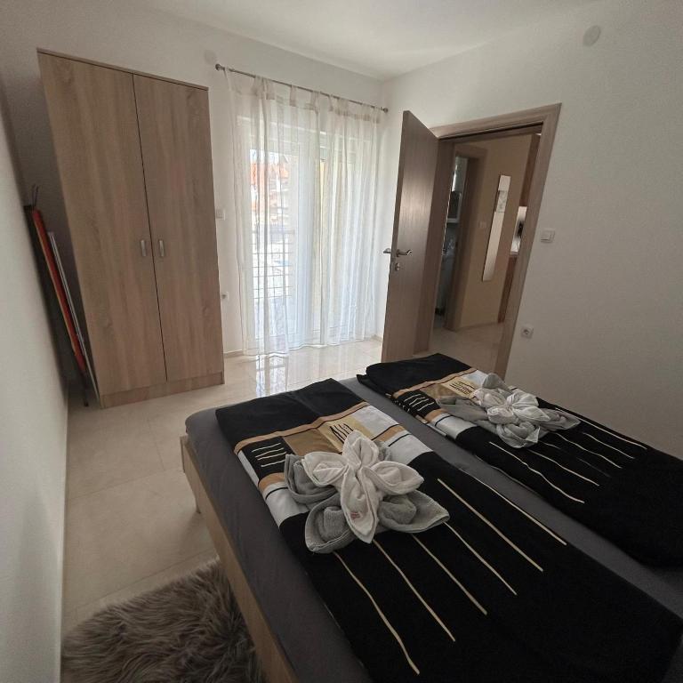 Postel nebo postele na pokoji v ubytování Villa Ronić