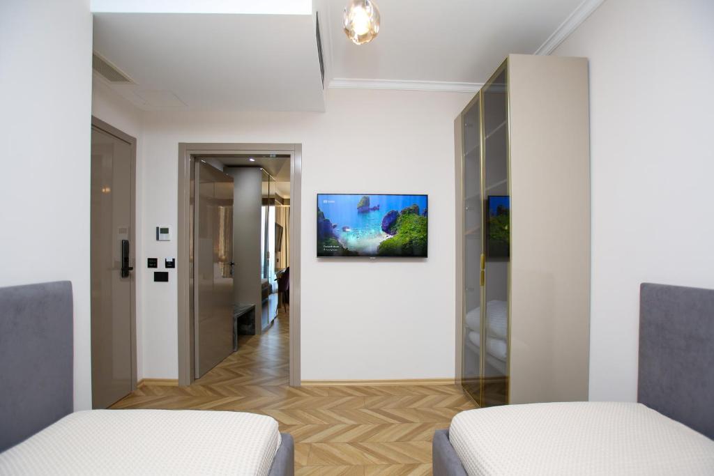 Postel nebo postele na pokoji v ubytování Belvedere Hotel & SPA