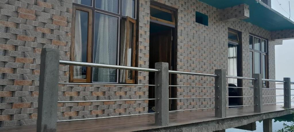 Balkón nebo terasa v ubytování Mukhia's HomeStay Amayras