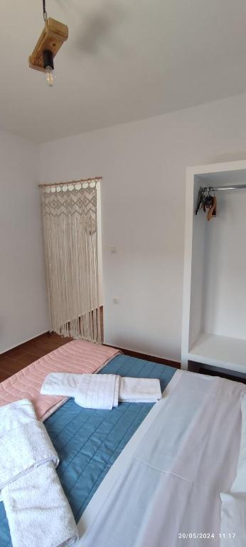 Postel nebo postele na pokoji v ubytování White Lotus seaside apartment