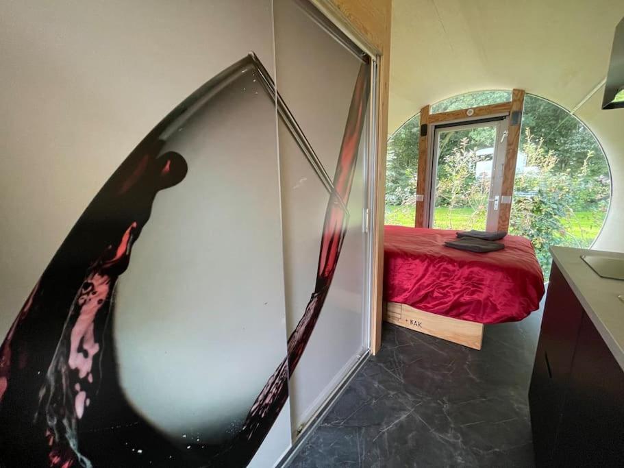 TV a/nebo společenská místnost v ubytování Eco-lodge locatie De Boergondier