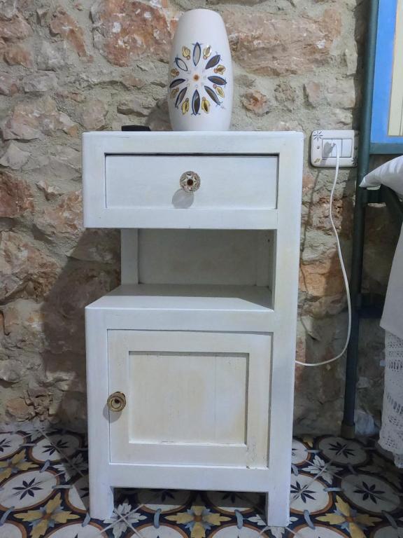 Fotografie z fotogalerie ubytování Dommu de Nannai Moro: Camera con bagno e balcone v destinaci Baunei