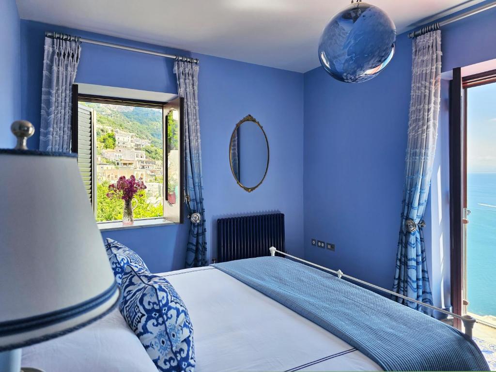 Giường trong phòng chung tại Villa Gra