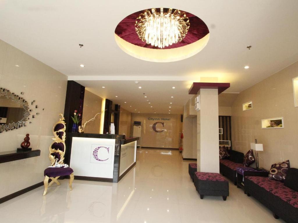 The lobby or reception area at Cityinn Hotel