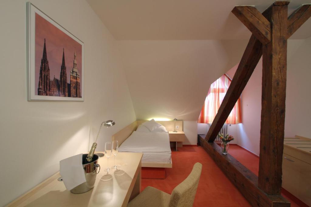 Postel nebo postele na pokoji v ubytování Hotel DAP