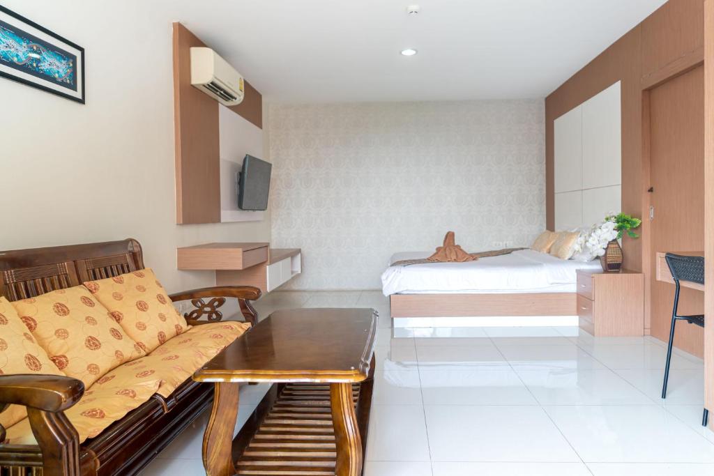 Posezení v ubytování The Infinity Suite Chiangrai