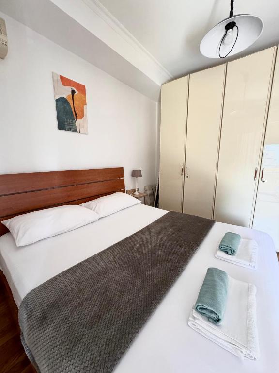 Postel nebo postele na pokoji v ubytování Tirana Vibes