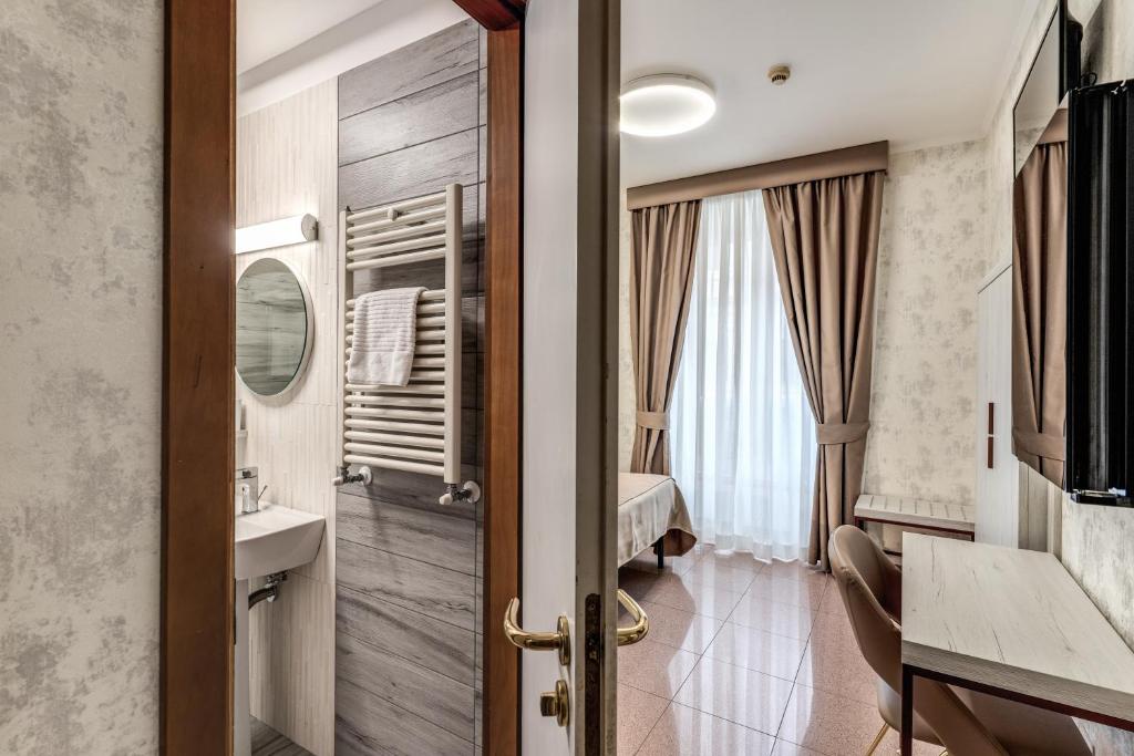 Koupelna v ubytování Hotel Milo