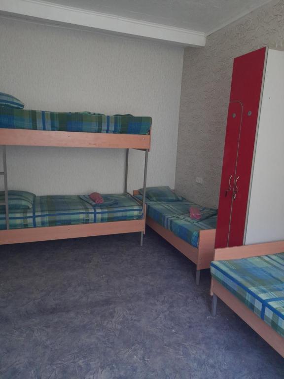 Postel nebo postele na pokoji v ubytování Eva Hostel