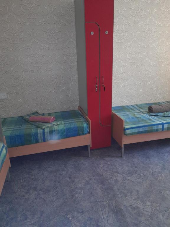 Postel nebo postele na pokoji v ubytování Eva Hostel