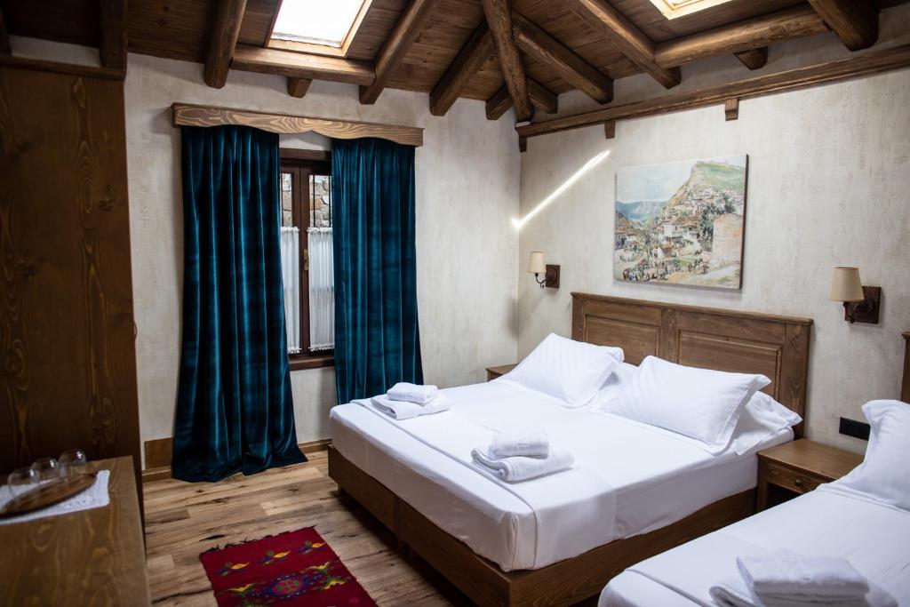 Postel nebo postele na pokoji v ubytování Vista Boutique Hotel