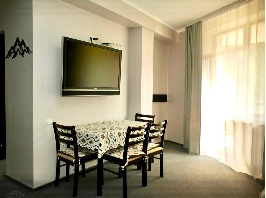 TV a/nebo společenská místnost v ubytování Hotel Skilandhouse