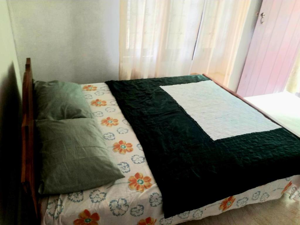 Postel nebo postele na pokoji v ubytování 20 House Villa