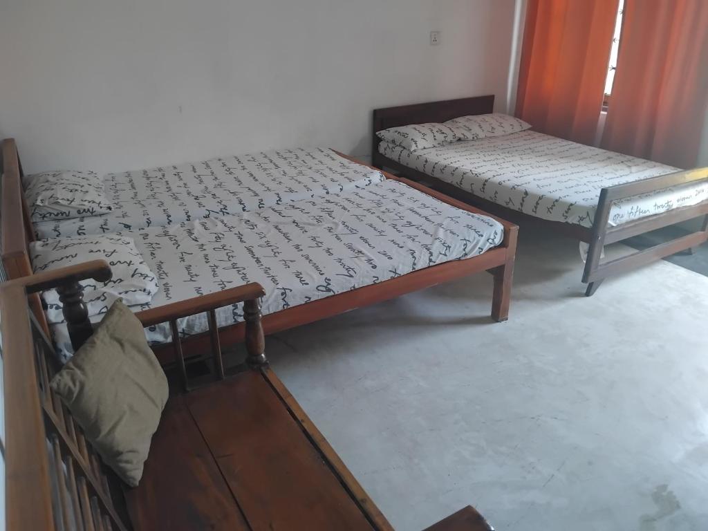 Postel nebo postele na pokoji v ubytování 20 House Villa
