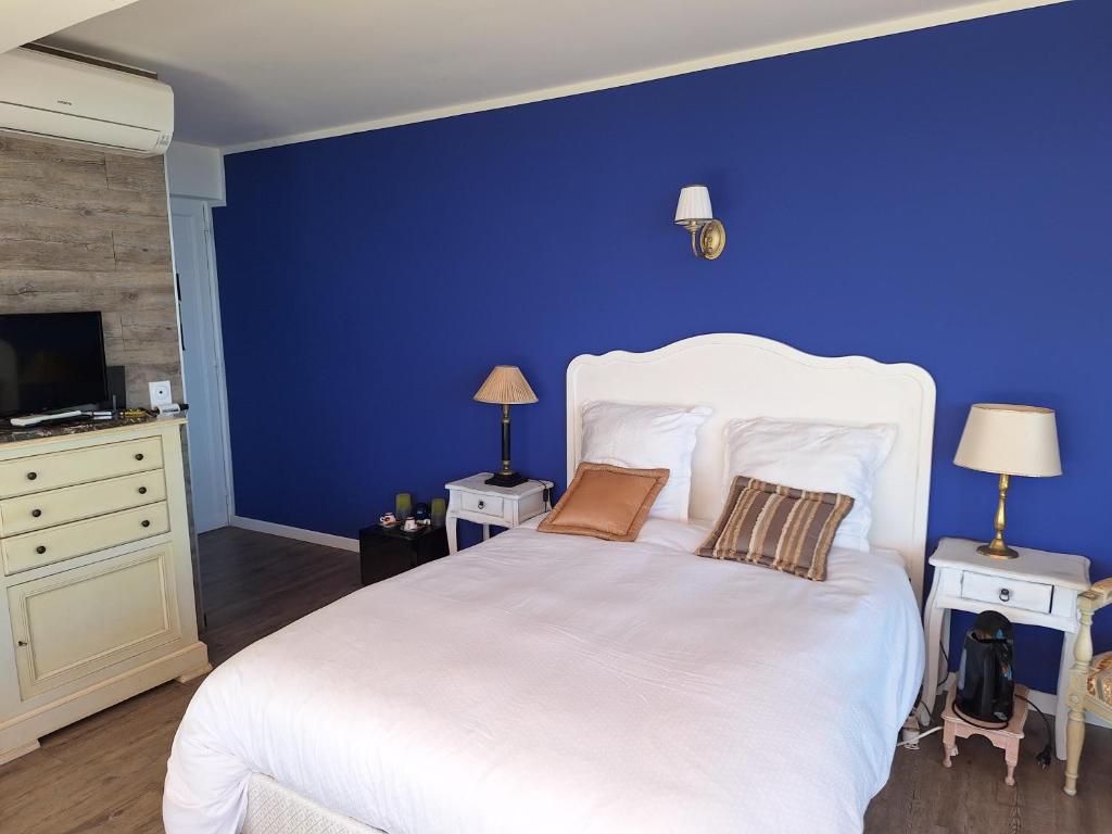 Postel nebo postele na pokoji v ubytování Chambre d'hôtes vue imprenable mer