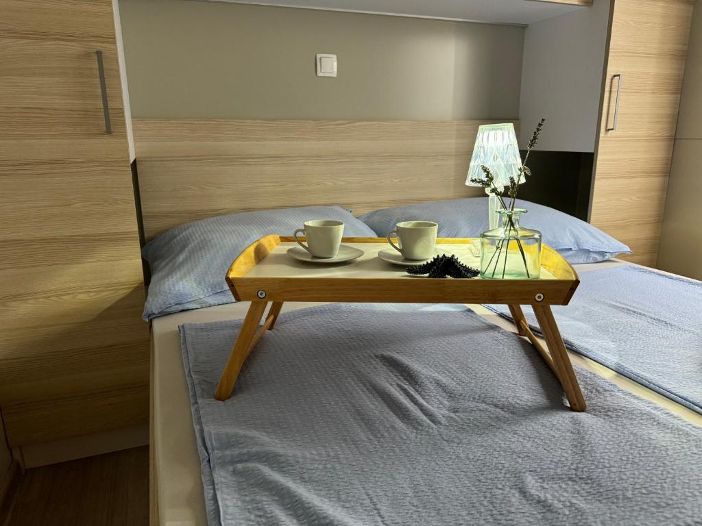Postel nebo postele na pokoji v ubytování Marty House Drage