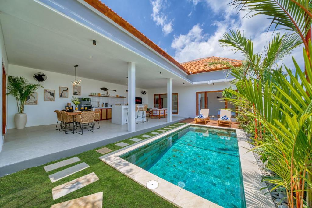 an image of a villa with a swimming pool at *NEW* Modern 3BD Villa in quiet Perenenan! in Canggu