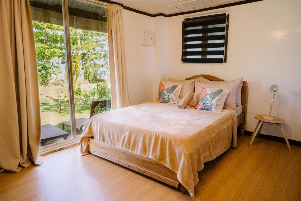Ένα ή περισσότερα κρεβάτια σε δωμάτιο στο Coconut Suite