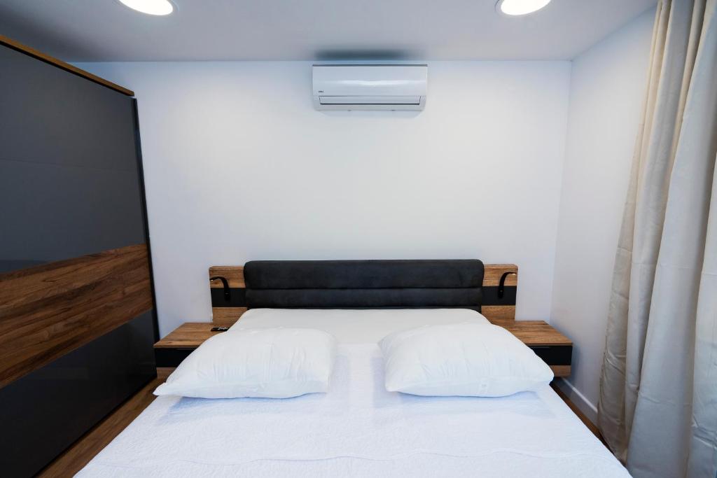 Posteľ alebo postele v izbe v ubytovaní M&M Pelivan apartments