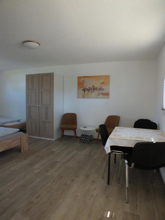 Postel nebo postele na pokoji v ubytování Ferienpark Buntspecht Apartment B