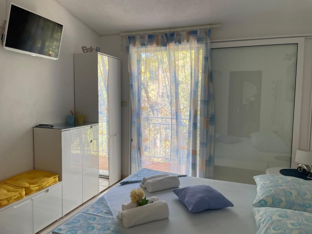 Posteľ alebo postele v izbe v ubytovaní Villa Terra Nostra Hvar