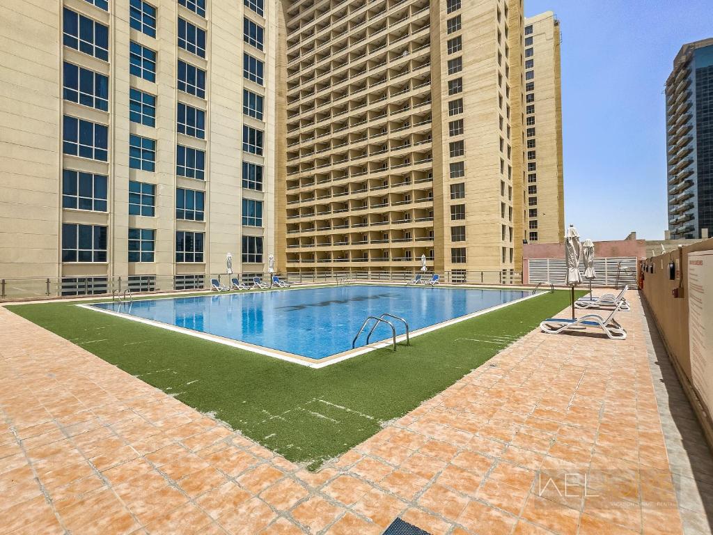 WelHome Greenery Apt for Modern Studio in Production City, Dubai