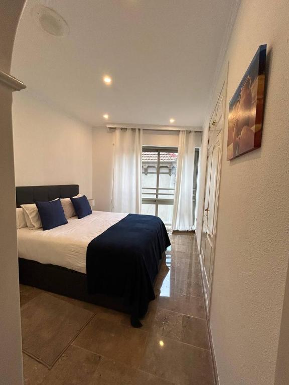 Postel nebo postele na pokoji v ubytování REGIDOR Cartagena