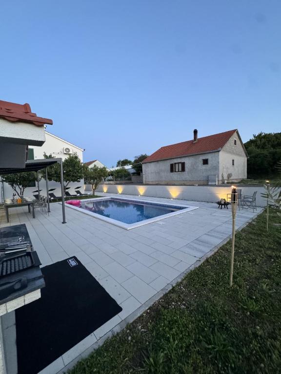 Bazén v ubytování Bella Vita nebo v jeho okolí