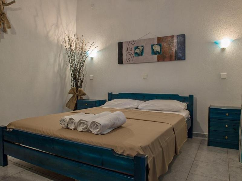 Postel nebo postele na pokoji v ubytování Toroni Dreams