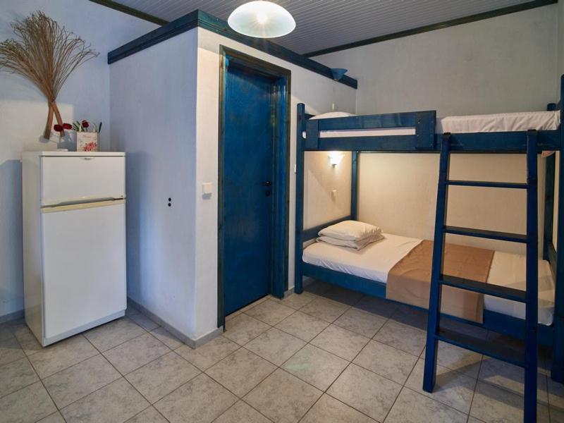 Postel nebo postele na pokoji v ubytování Toroni Dreams