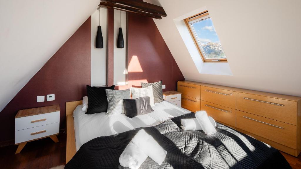 Posteľ alebo postele v izbe v ubytovaní Apartament Tatry Premium