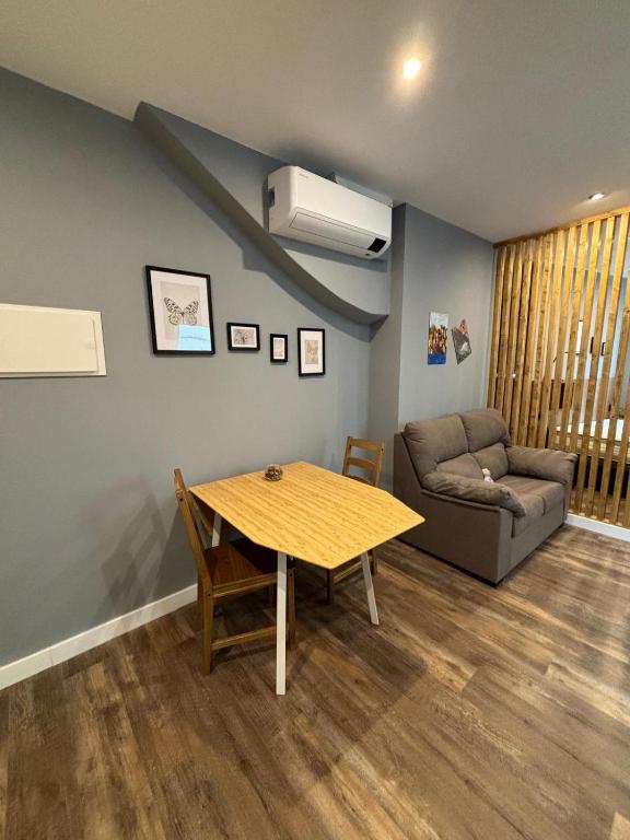 Posezení v ubytování NOARU Apartamentos