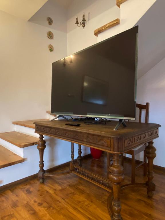 Televízia a/alebo spoločenská miestnosť v ubytovaní Riverside Stay at Stary Rynek - billiards, foosball and arcade games
