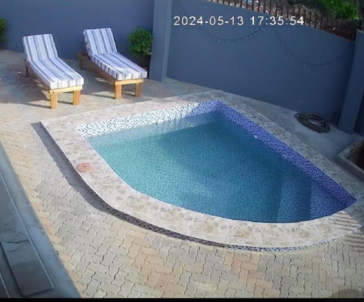 Πισίνα στο ή κοντά στο Genesis Guesthouse