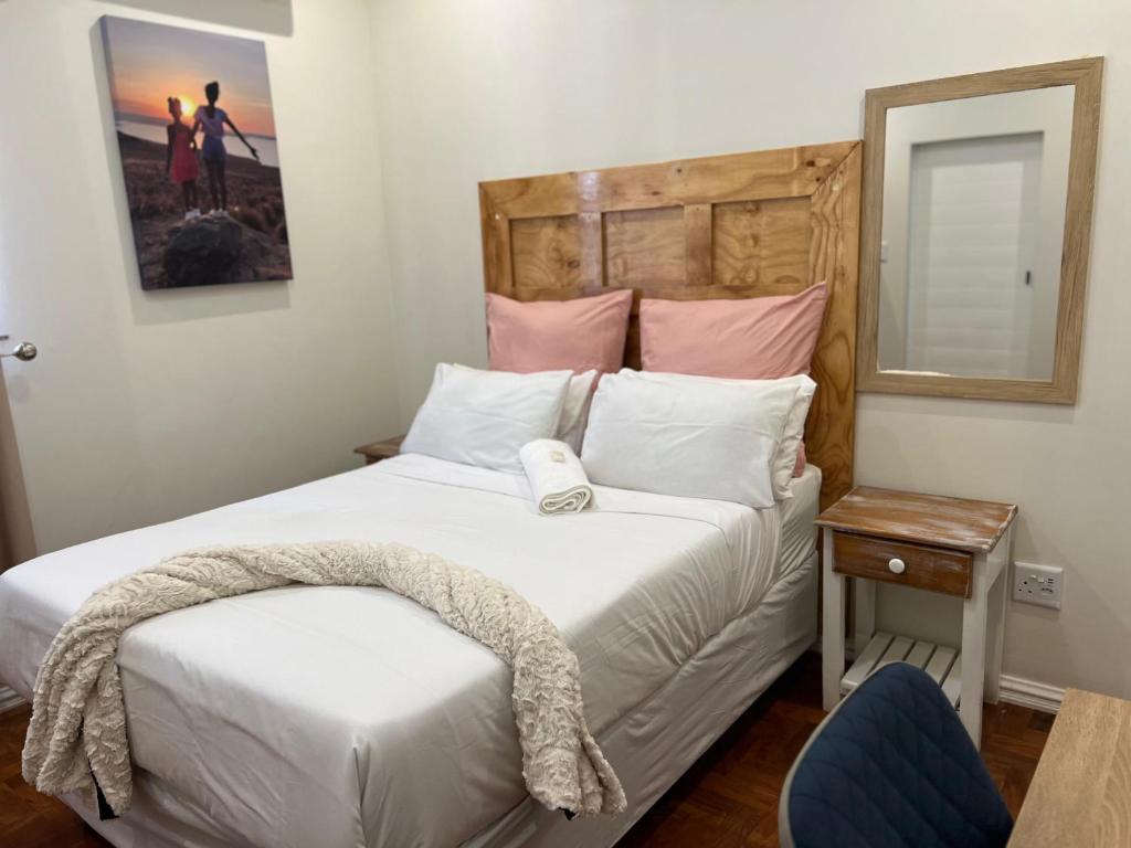 Una cama o camas en una habitación de La Vue