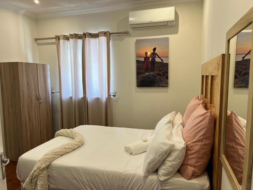 Una cama o camas en una habitación de La Vue
